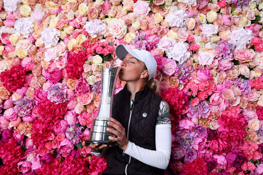 AIG Women's Open champion Sophia Popov in front of a floral wall
